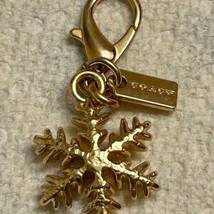 Coach Gold Toned Snowflake Bag Charm / Keychain